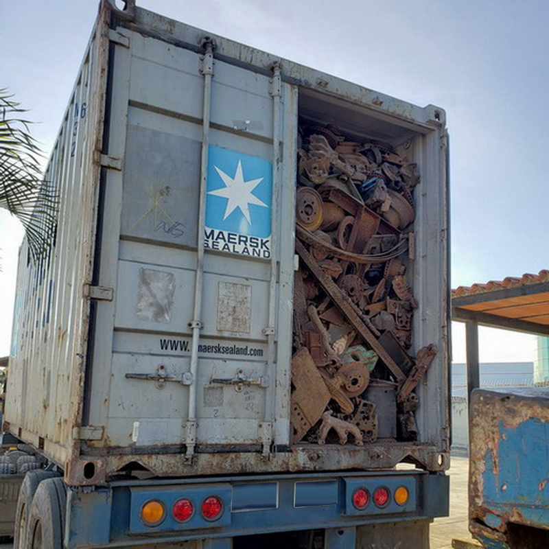 Piled HMS 1&2 heavy melting steel scrap in a processing yard