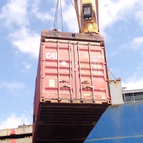Scrap metal loaded into shipping containers